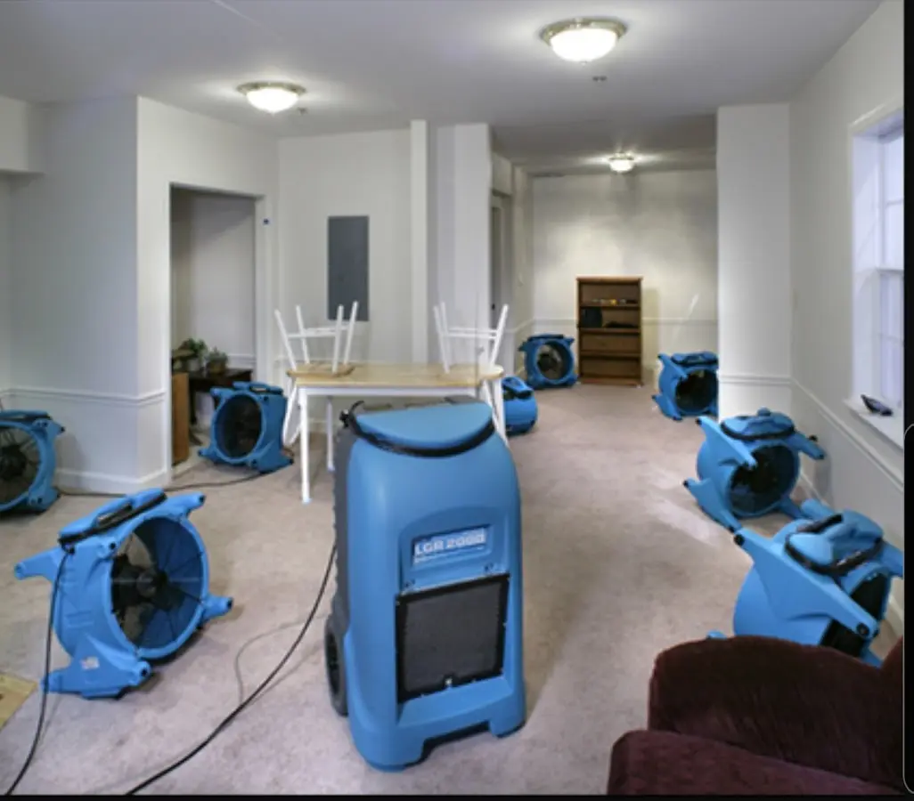 Air movers and dehumidifier setup for Water Damage Restoration in Osage Beach